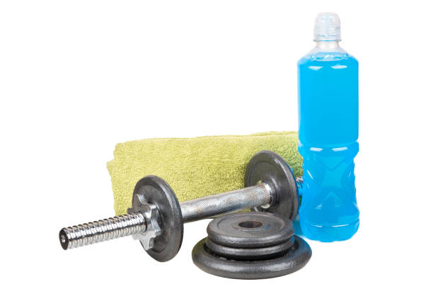 istock Blue isotonic drinks bottle with dumbbell, towel and pancakes isolated on white background 1463675729