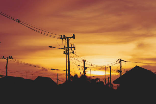 istock electric pole at small village and sunset 1463675917