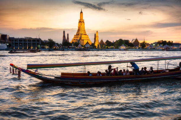 istock Wat Arun ,lit up after sunset,along the Chao Phraya river,Bangkok,Thailand. 1463677655