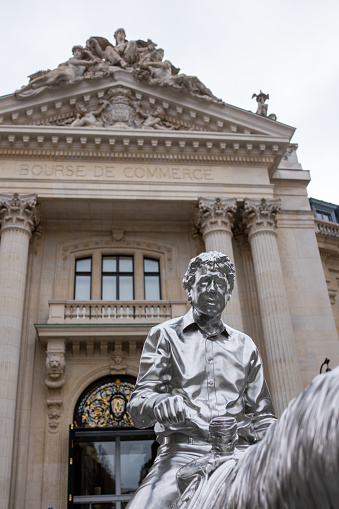France, Paris February 03 2023: The Bourse de commerce is a building in Paris, originally used as a place to negotiate the trade of grain and other commodities, now the building has been refurbished and it is a Museum of art. In front of the Museum there is now a Charles Ray statue.