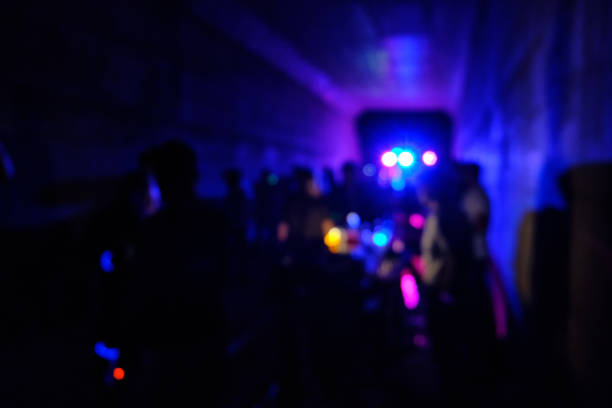 istock Silhouettes of people on a dance party 1463682137