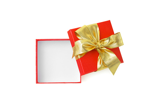 Christmas gift box with tag on white background with copy space for text or any other product to insert.