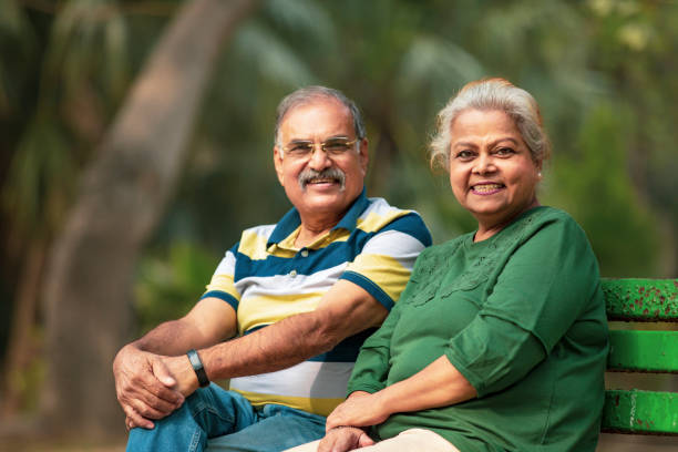 istock happy Old couple spending time together at park. 1463691216
