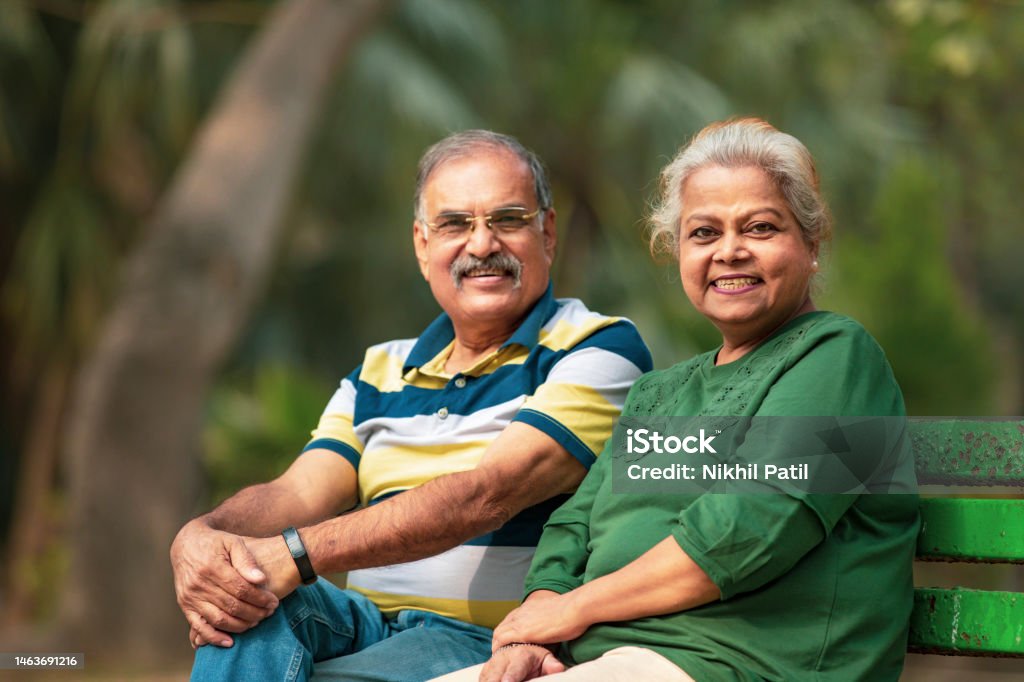 happy Old couple spending time together at park. Senior Adult Stock Photo