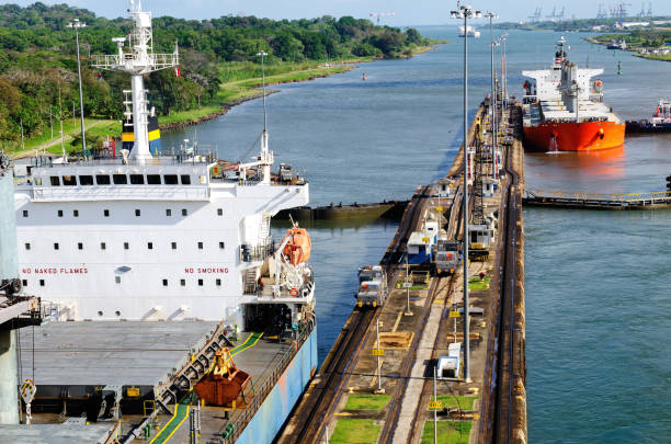 istock Two cargo ship transiting the Miraflores locks in the Panama Canal 1463692366