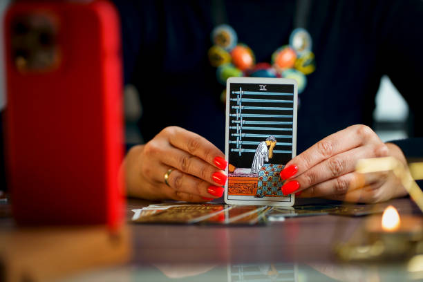 istock woman's hands holds a tarot cards 1463696577