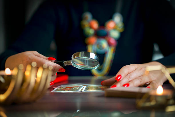istock consider tarot cards throw a magnifying glass. 1463696622