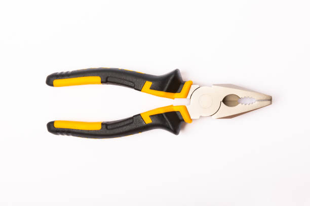istock Pliers. Yellow and black pliers isolated on white background. 1463699939