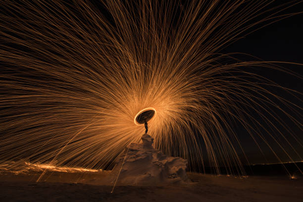 istock Steel wool spinning photography 1463700853