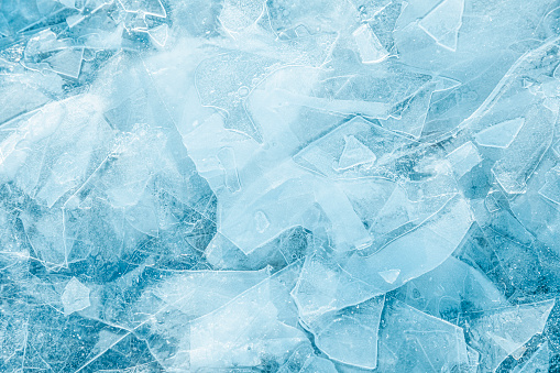 Fondo abstracto azul hielo. Cristales de hielo fragmentados photo