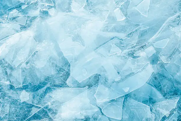 Photo of Abstract ice blue background. Fragmented ice crystals