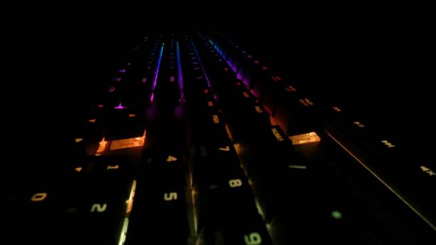 istock High-angle view of a colorful illuminated computer keyboard - LED-designed hardware 1463702530