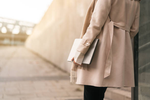 istock University student carrying a laptop 1463709194