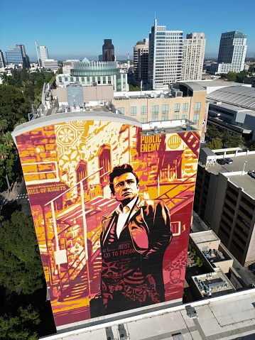 Sacramento, United States – October 11, 2022: The vertical shot of huge wall mural of legendary John Cash in Sacramento