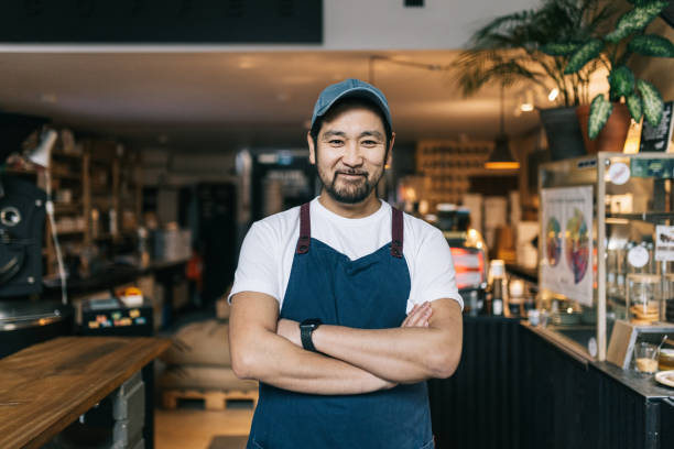 istock Confident Japanese owner standing at his coffee roastery 1463711765