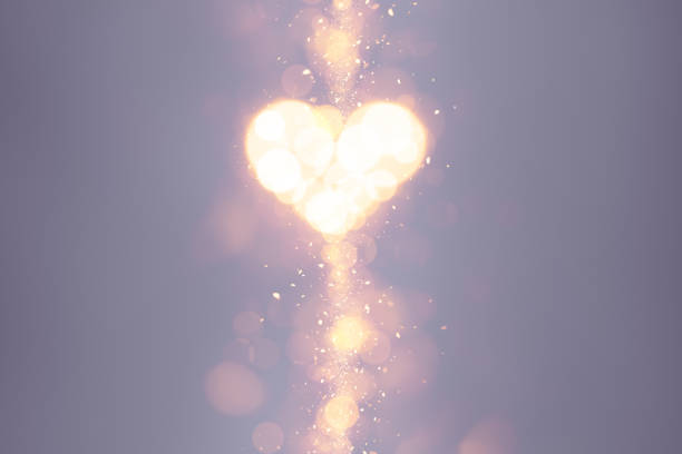 Light bokeh heart on valentines abstract background. This file is cleaned and retouched.