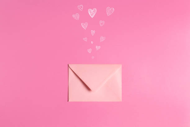 istock Valentine letter with painted hearts on pink background 1463713610