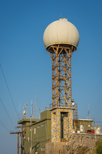 Santorini, Greece - August 2022 : Telecommunication tower near the Prophet Elias Lookout Point - the highest place n Santorini Island