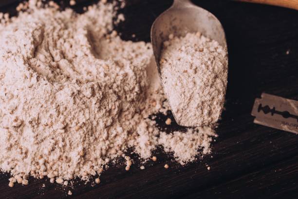 istock Closeup of flour on metal spoon 1463714370