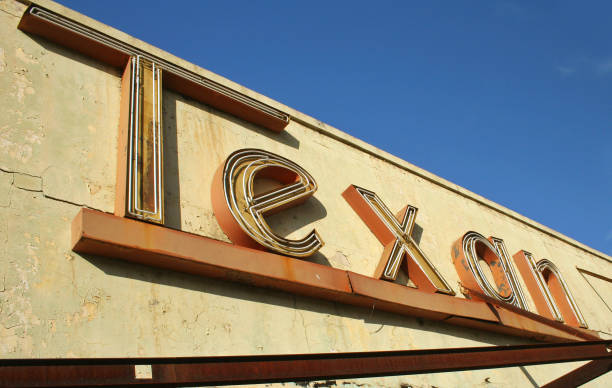 istock Abandoned building sign Texan on the blue sky background 1463715647