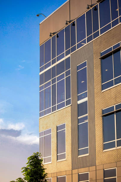 istock Vertical shot of an office building on a cloudy day 1463716057