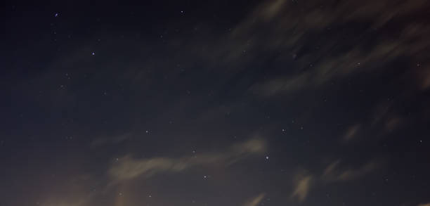 istock Low angle shot of a starry sky with long exposure at night - great for wallpapers 1463722190