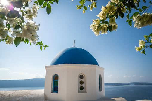 Famous blue dome of an orthodox church in Oia town, Santorini Island, Greece