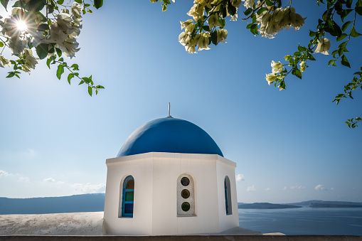 Famous blue dome of an orthodox church in Oia town, Santorini Island, Greece