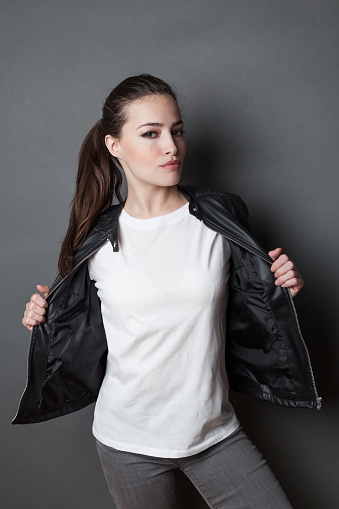 young  woman in white t-shirt and black leather jacket  studio shot,  model mock up