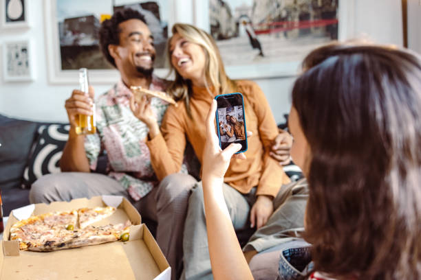 istock Young cheerful people on a house party 1463731330
