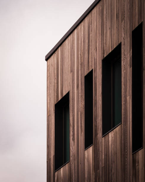 A modern building with wooden planks walls
