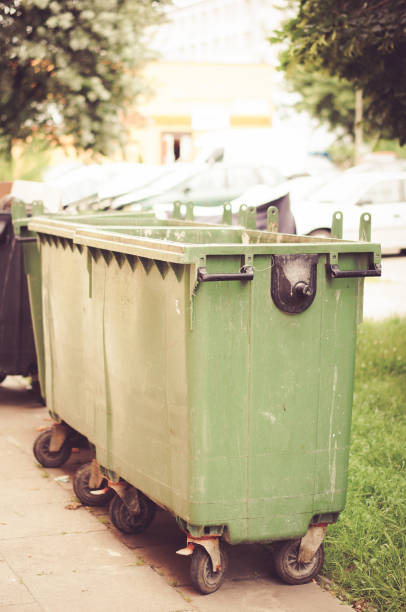 istock Vertical shot of garbage containers 1463735336