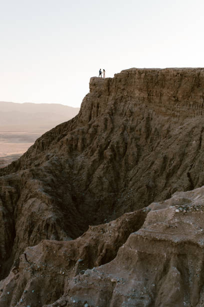 Vertical shot of a couple at the Anza-Borrego DesertPark in southern California, United States A vertical shot of a couple at the Anza-Borrego Desert Park in southern California, United States fonts point photos stock pictures, royalty-free photos & images