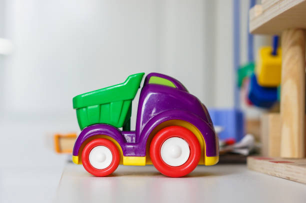 istock Colorful plastic toy car on the table 1463738660