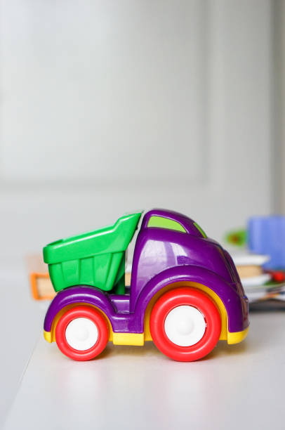 istock Vertical shot of a colorful plastic toy lorry 1463738670
