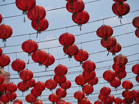 Red lanterns, blue silver sky, gray and white light used as background.