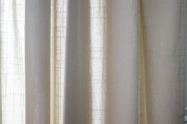istock View of beautiful curtains in front of a window 1463741039