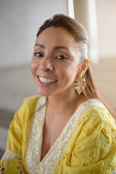 istock Young Spanish woman smiling and looking at the camera 1463742555