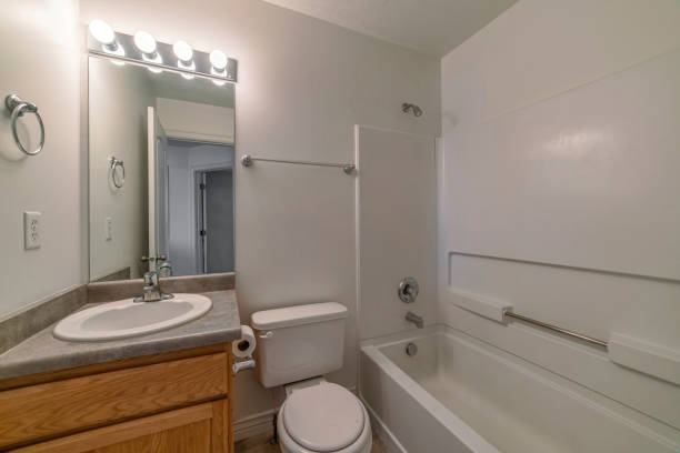 istock White bathroom with sink, flush toilet and a bathtub 1463744605