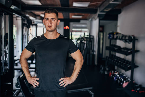 istock Fit man in gym 1463749091
