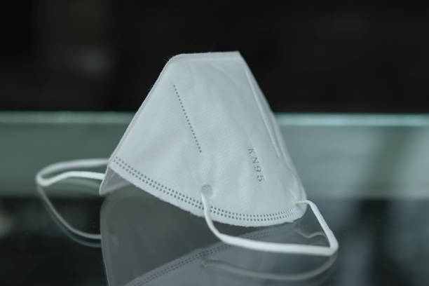 istock Kn95 mask Covid-19 mask on a glass surface 1463754988