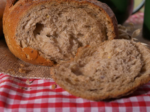 istock Loaf of wholemeal bread on kitchen table 1463756468
