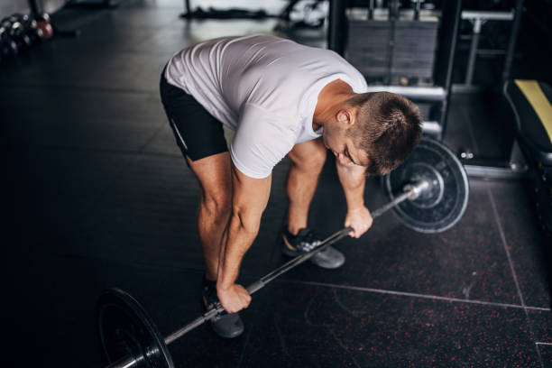 istock Man weightlifting in gym 1463756731