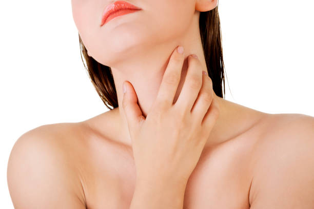 istock Sexy woman touching her neck on a white background 1463759820