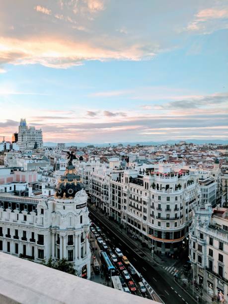 Aerial view of Gran Via street at dawn in Madrid, Spain An aerial view of Gran Via street at dawn in Madrid, Spain madrid city view stock pictures, royalty-free photos & images