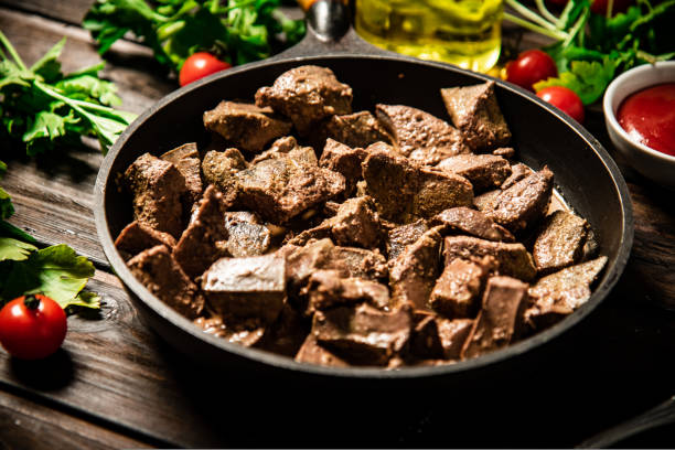 istock A frying pan with cooked liver on the table. 1463763038