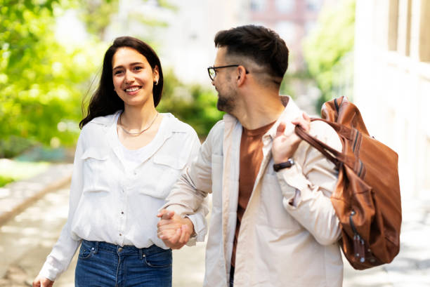 istock Loving couple walking in the city 1463765247