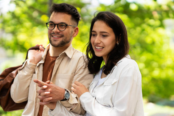 istock Happy young couple enjoy in the park 1463767115