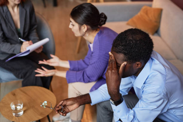istock Stressed Man Visiting Family Psychologist 1463774466