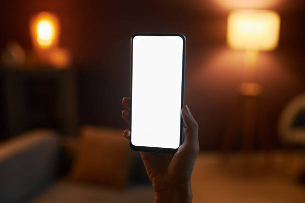istock female hand holding smartphone with white screen mockup 1463776483